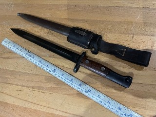 Yugoslavian model 1948, with scabbard and leather frog, 9 1/2- inch blade, 15-inch long Yugoslavian model 1948, with scabbard and leather frog, 9 1/2- inch blade, 15-inch long